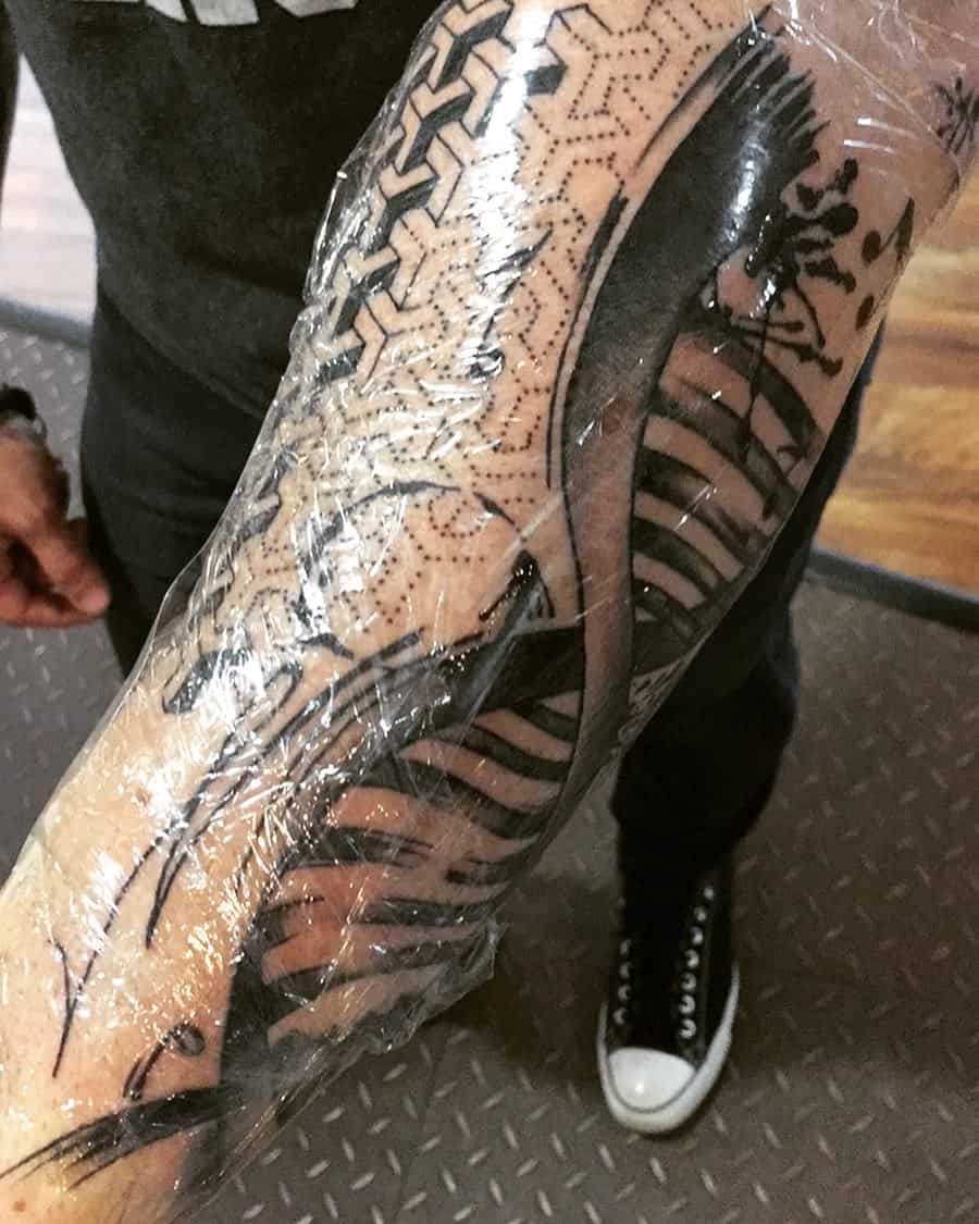 Ever Seen New Tattoos Covered With Plastic Wrap - Here's Why